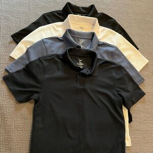 Bundle of 4 polo shirts